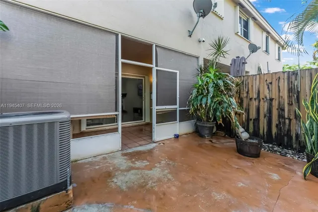 a view of a porch with seating space