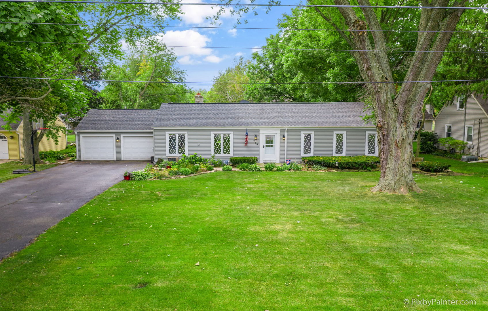736 Carlisle Road Batavia, IL 60510 - Photo 1 of 25 a front view of house with yard and green space