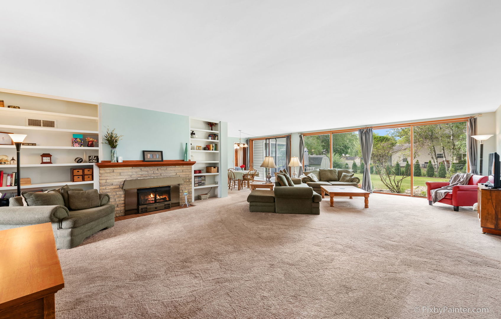 736 Carlisle Road Batavia, IL 60510 - Photo 5 of 25 a living room with furniture and a fireplace