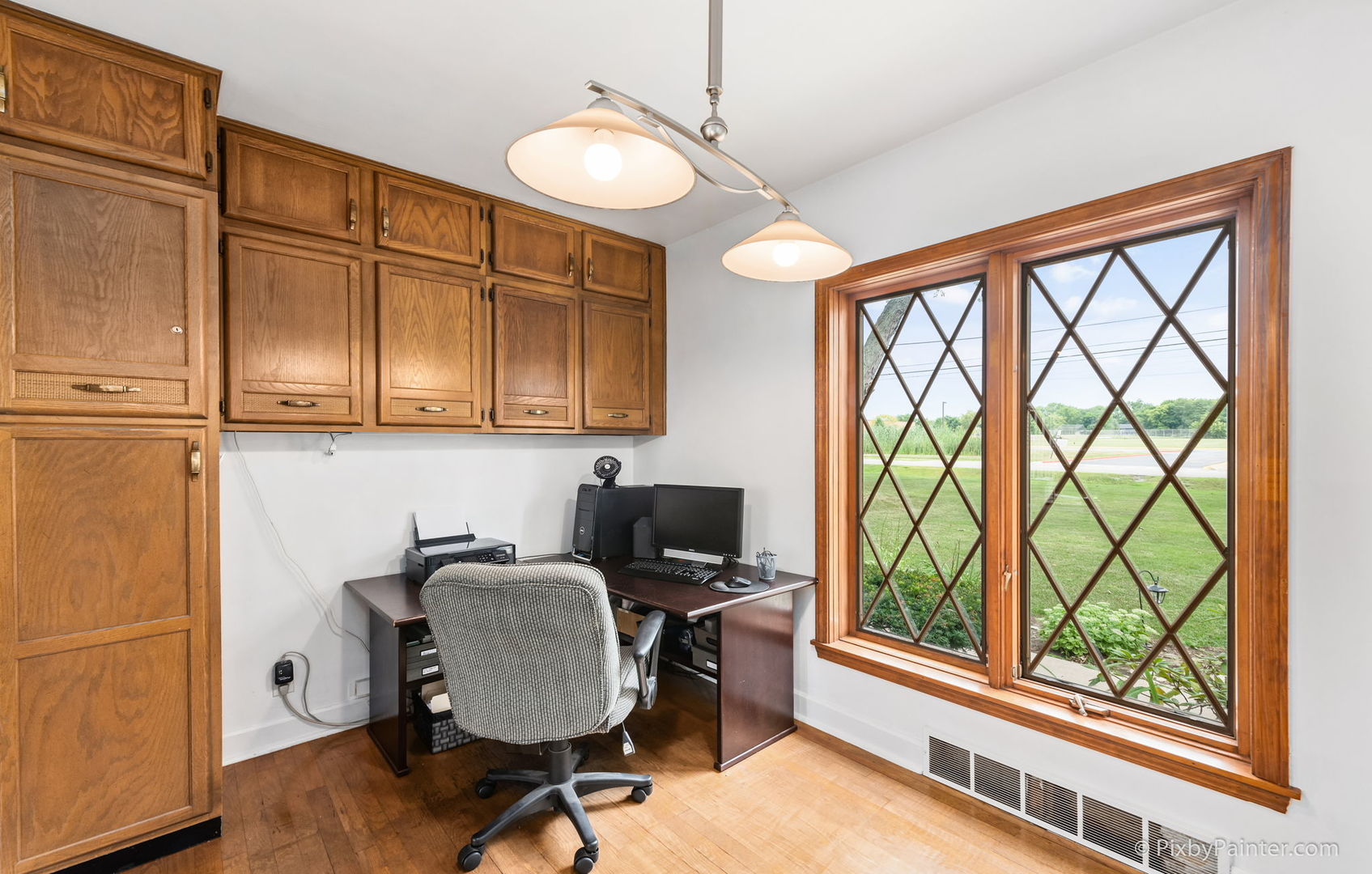 736 Carlisle Road Batavia, IL 60510 - Photo 9 of 25 a view of workspace with wooden floor windows