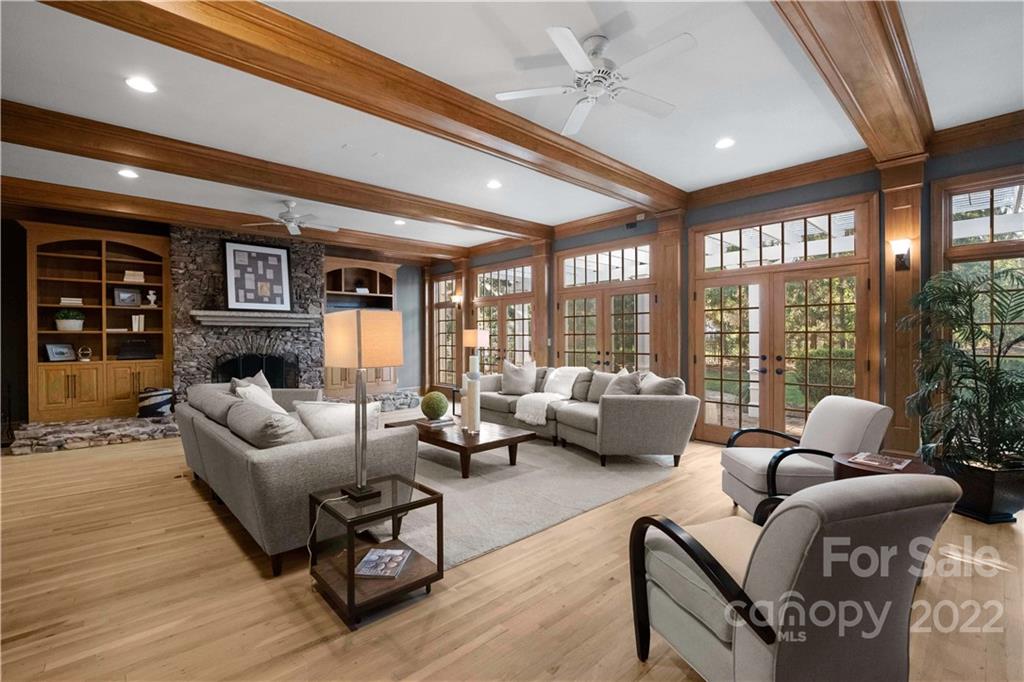 2026 South Wendover Road Charlotte, NC 28211 - Photo 13 of 31 a living room with fireplace furniture and a large window