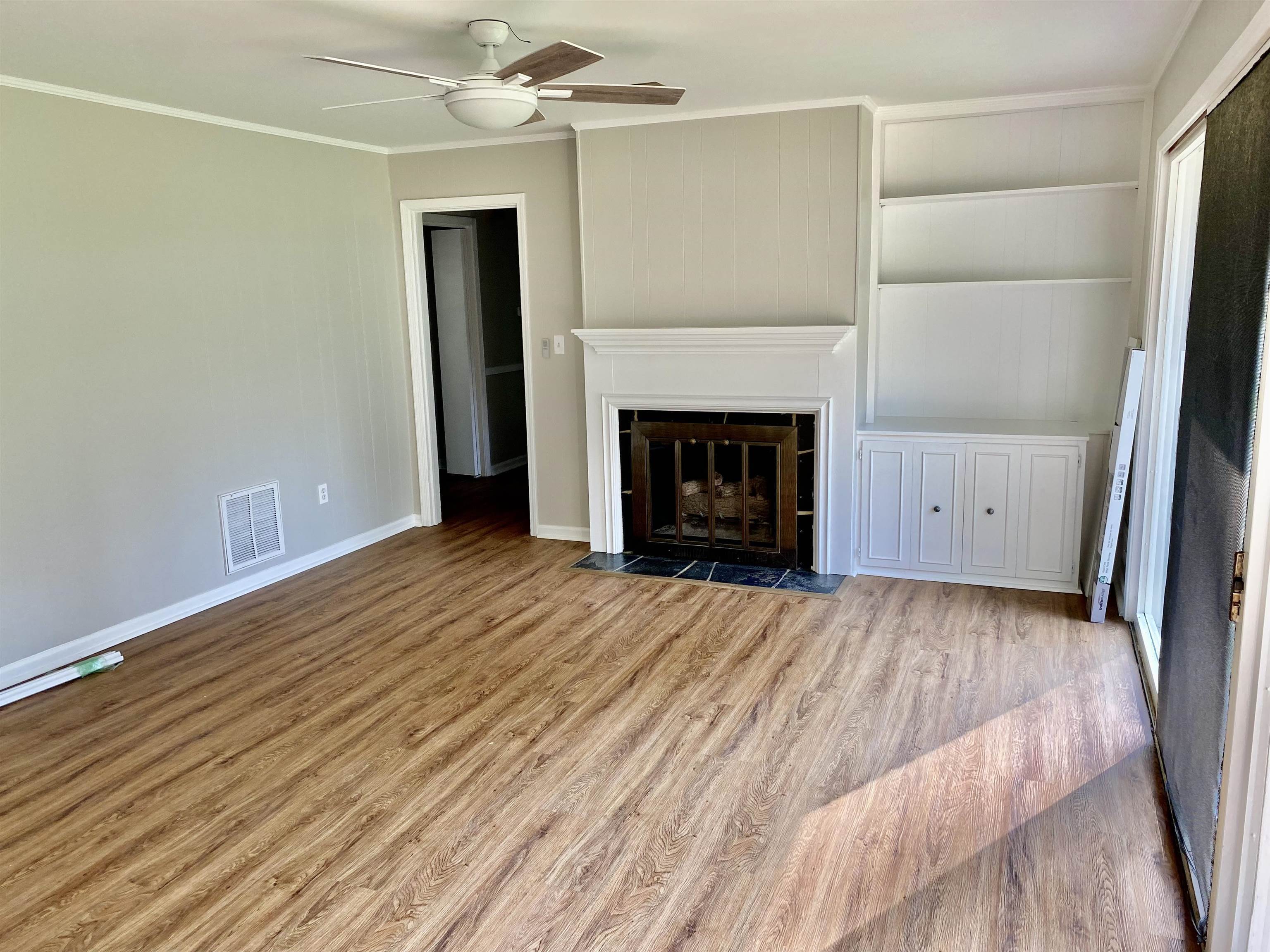 16 Jefferson Drive Rome, GA 30165 - Photo 11 of 26 a view of a livingroom with a fireplace and window