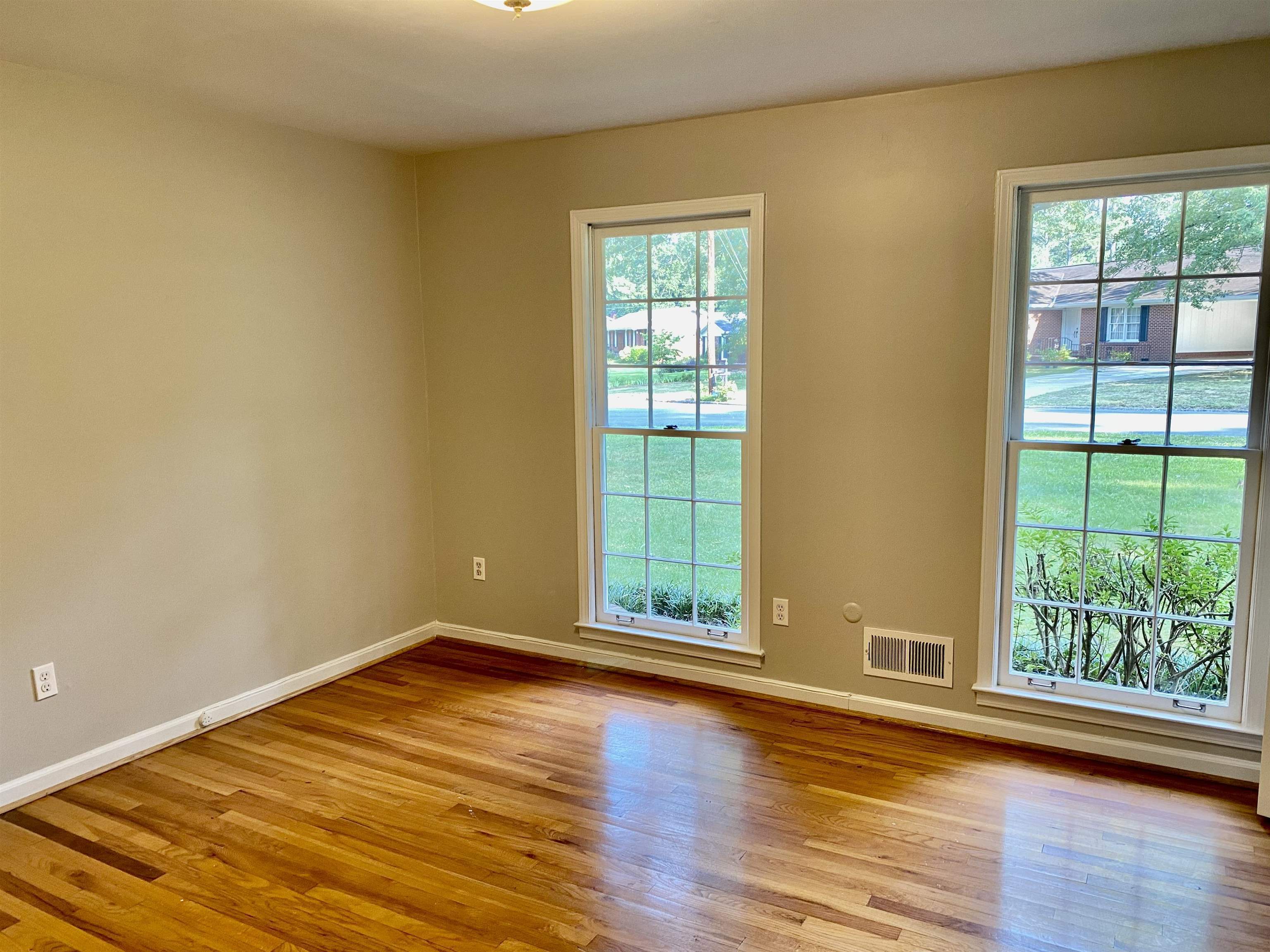 16 Jefferson Drive Rome, GA 30165 - Photo 15 of 26 a view of an empty room with wooden floor and a window
