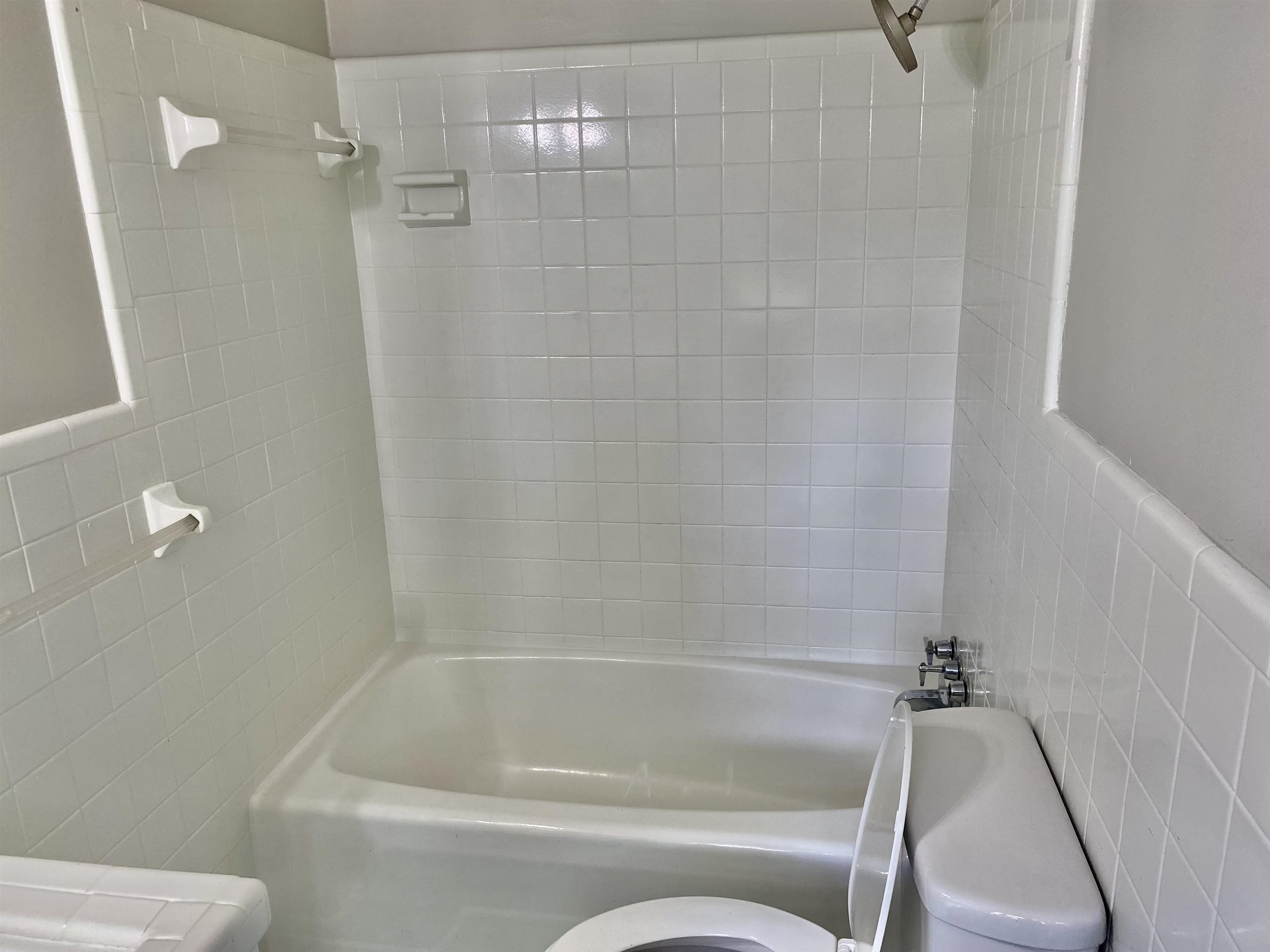 16 Jefferson Drive Rome, GA 30165 - Photo 18 of 26 a bathroom with a tub and a shower