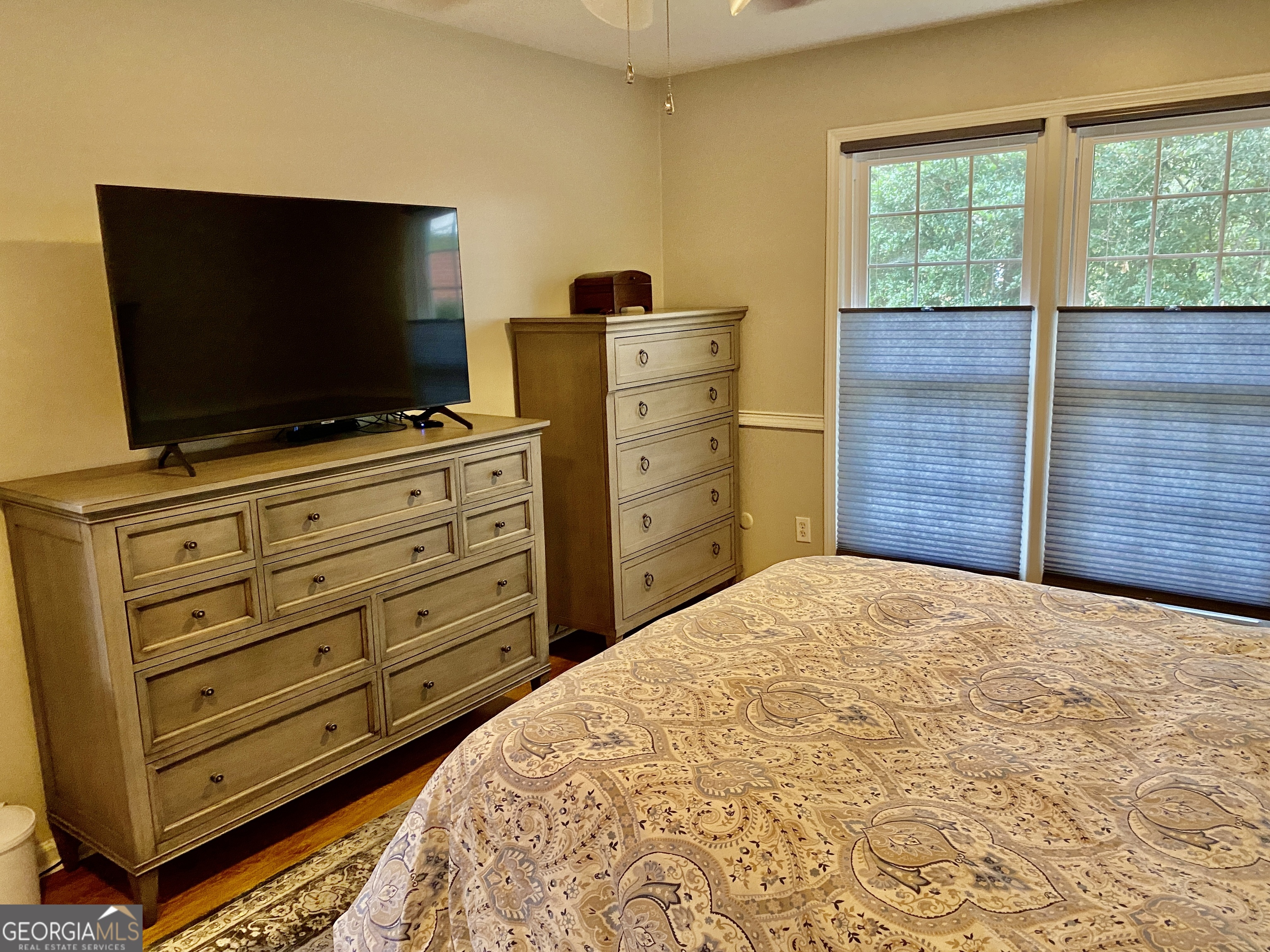 16 Jefferson Drive Rome, GA 30165 - Photo 20 of 26 a bedroom with a bed and flat screen tv