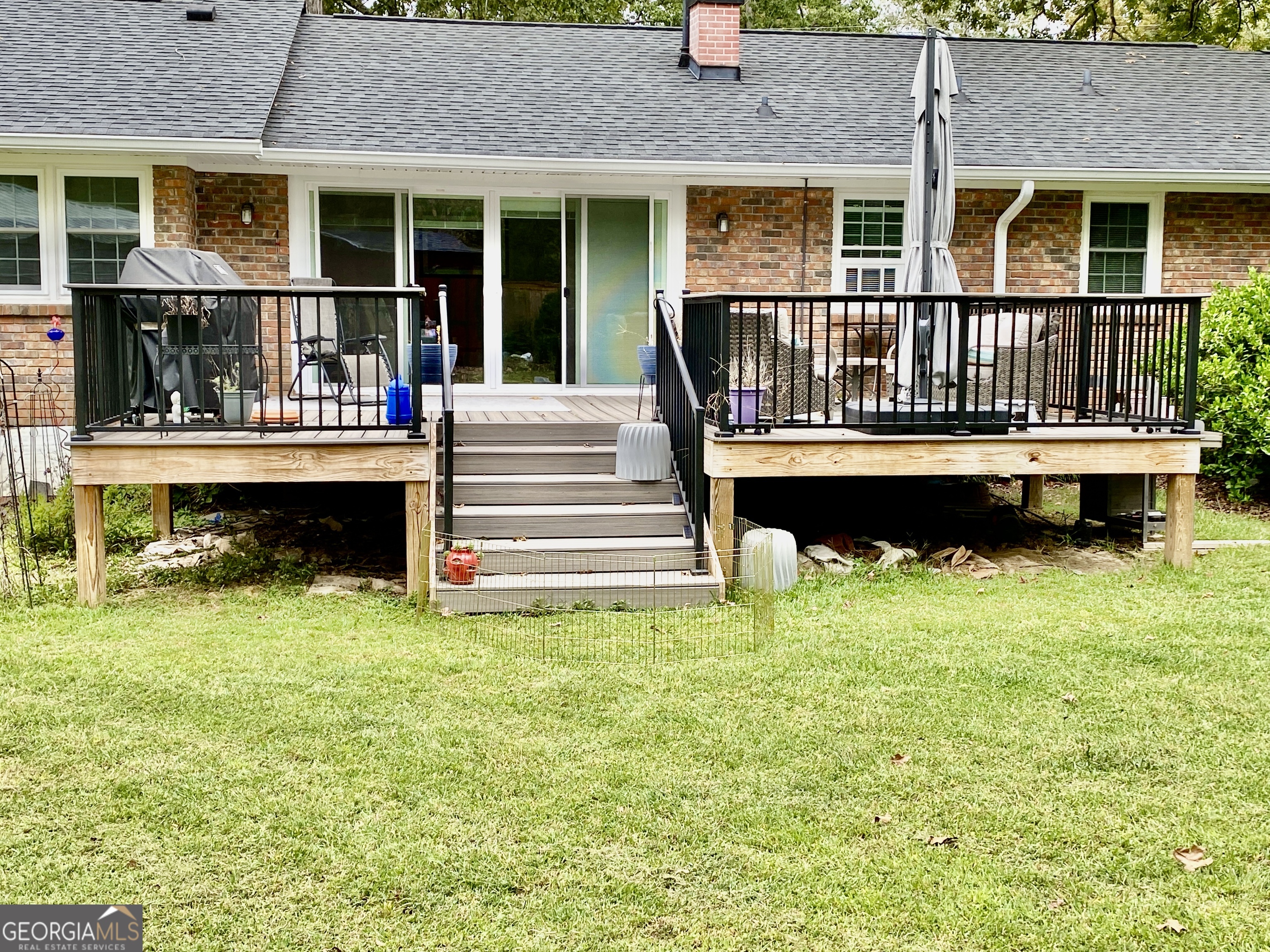 16 Jefferson Drive Rome, GA 30165 - Photo 26 of 26 a view of a house with a swimming pool and a yard with furniture