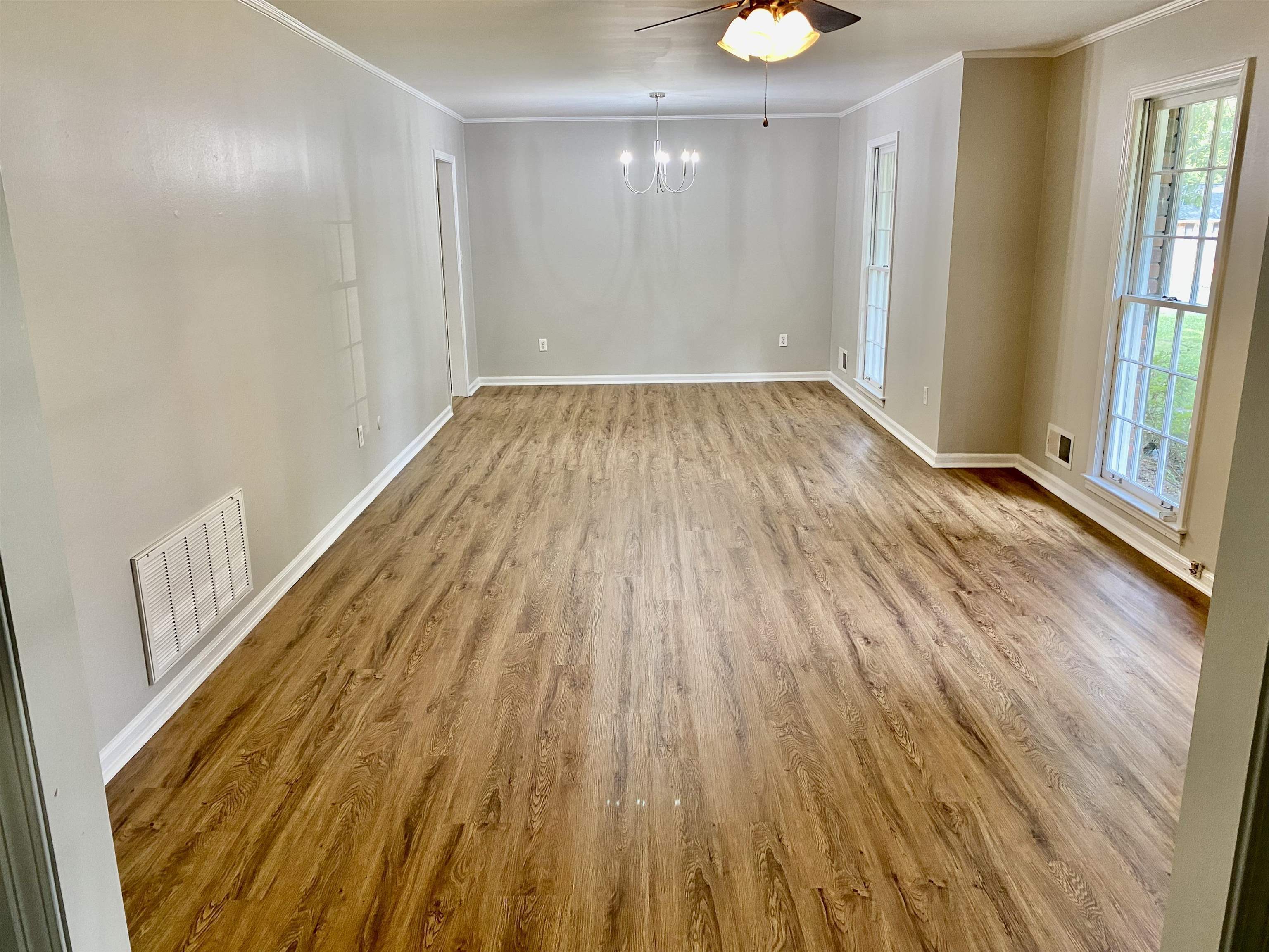 16 Jefferson Drive Rome, GA 30165 - Photo 8 of 26 wooden floor in an empty room with a window