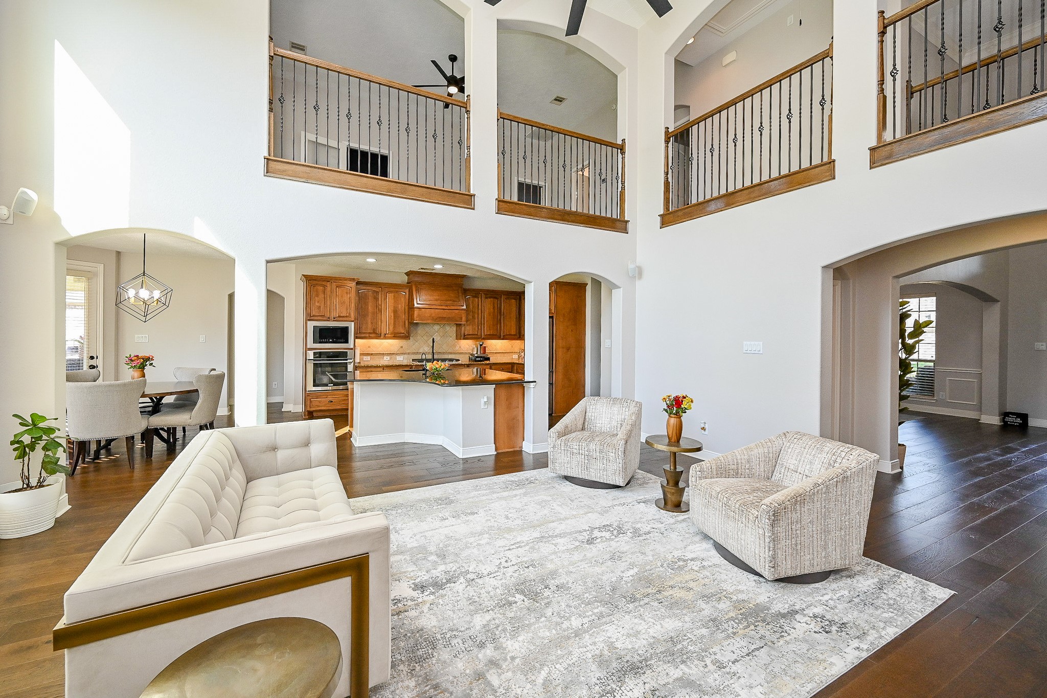 17607 Astrachan Road Richmond, TX 77407 - Photo 19 of 50 a living room with fireplace furniture and a wooden floor