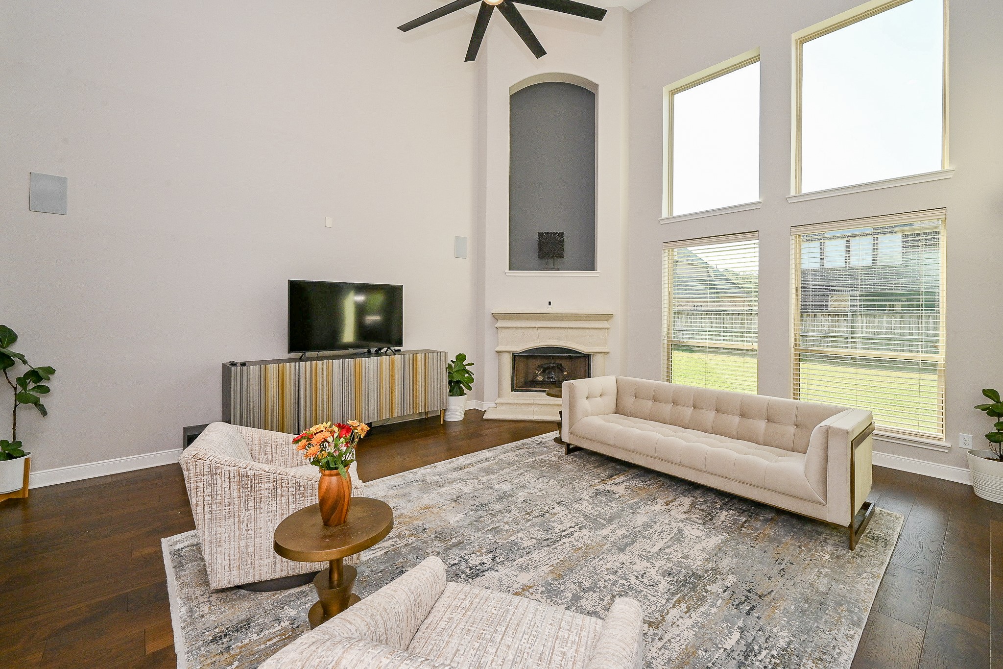 17607 Astrachan Road Richmond, TX 77407 - Photo 20 of 50 a living room with furniture and a fireplace