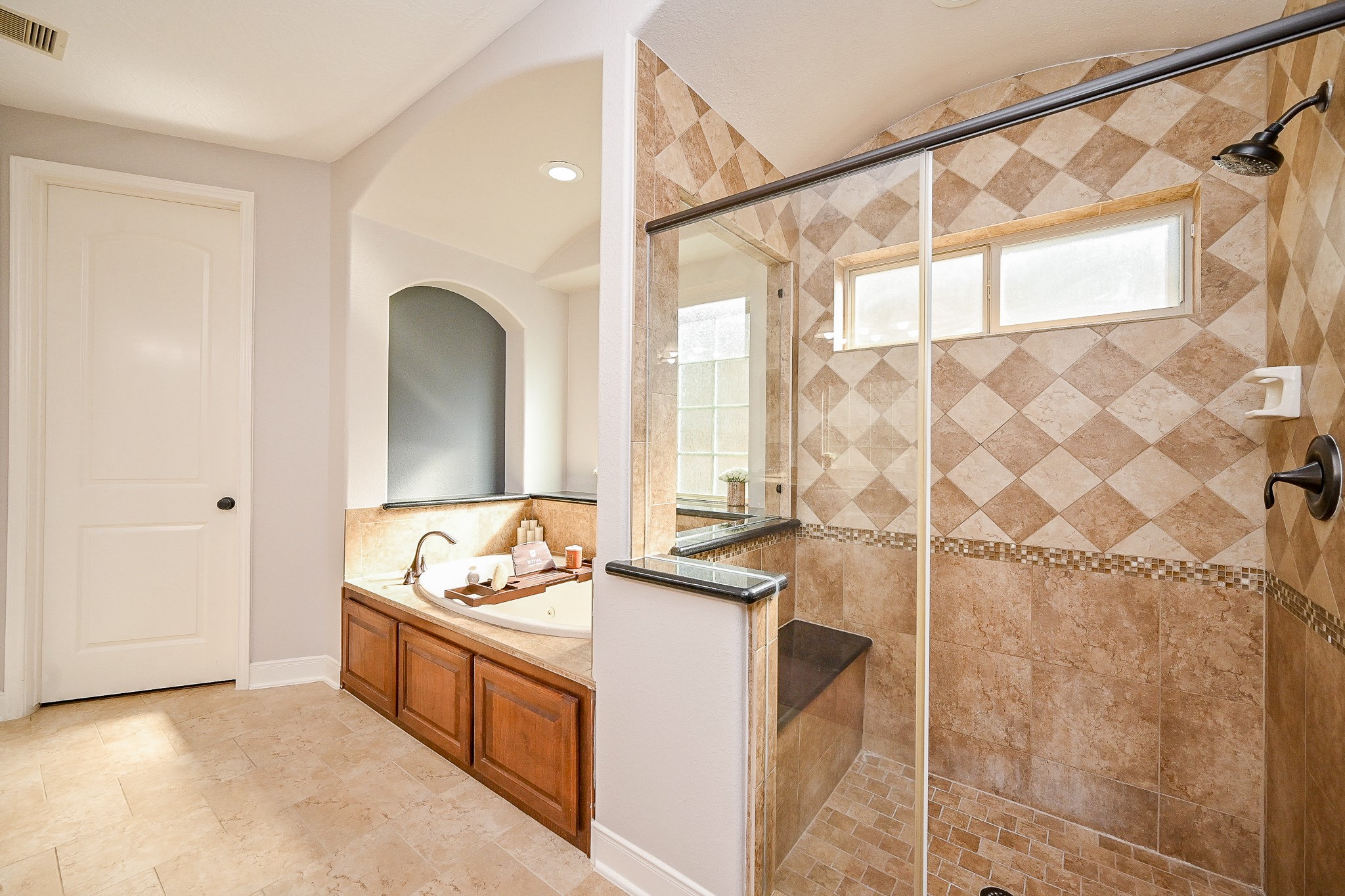 17607 Astrachan Road Richmond, TX 77407 - Photo 27 of 50 a bathroom with a sink and a tub