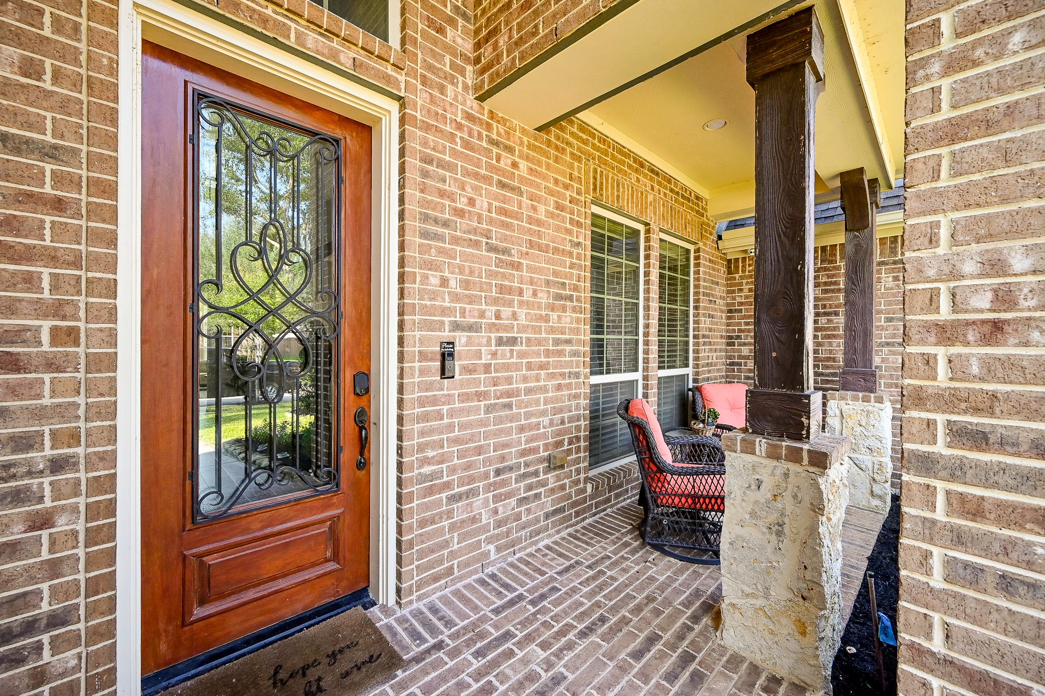 17607 Astrachan Road Richmond, TX 77407 - Photo 4 of 50 a view of a balcony with chair and the potted plant
