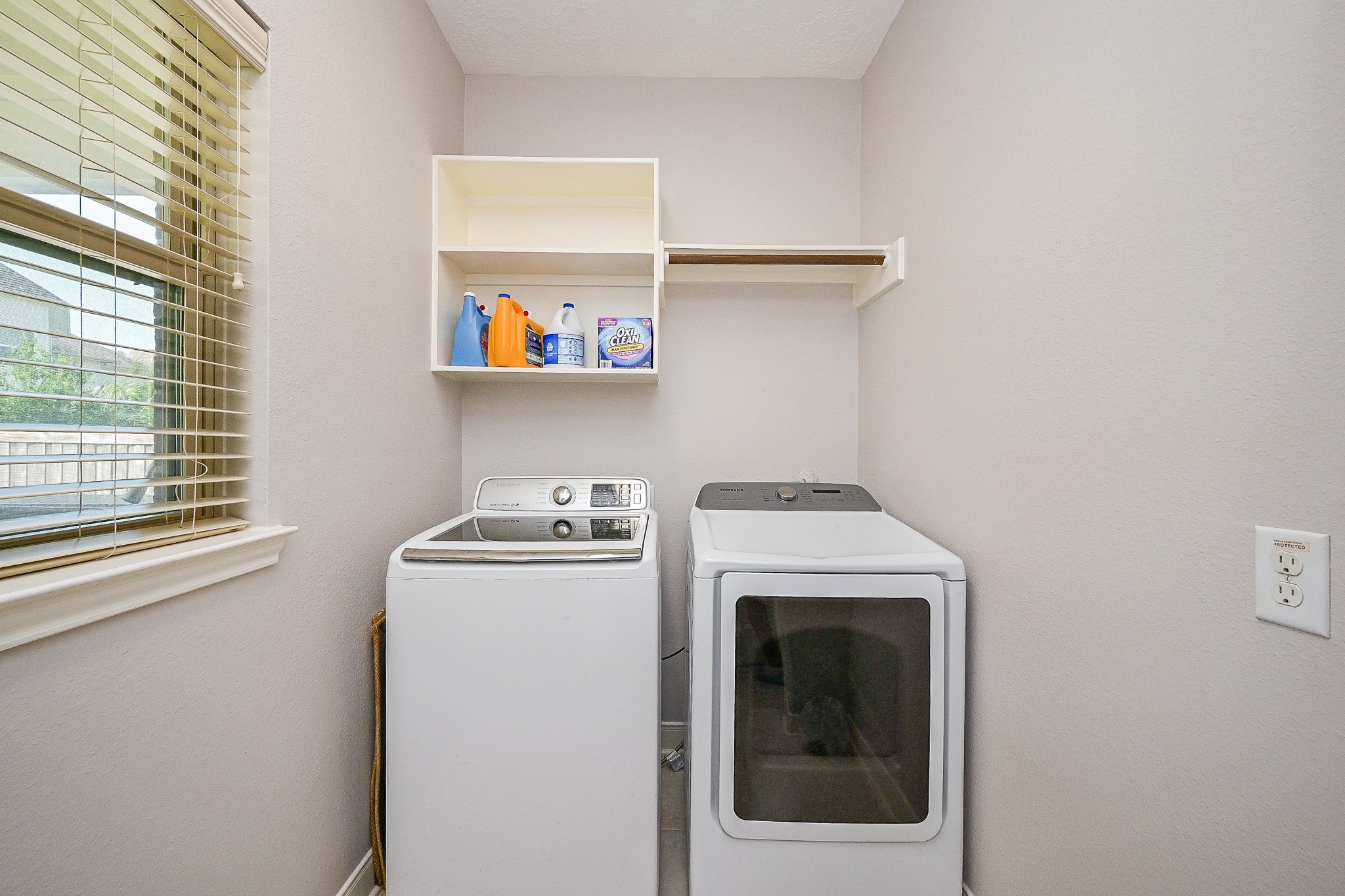 17607 Astrachan Road Richmond, TX 77407 - Photo 41 of 50 a utility room with dryer and washer