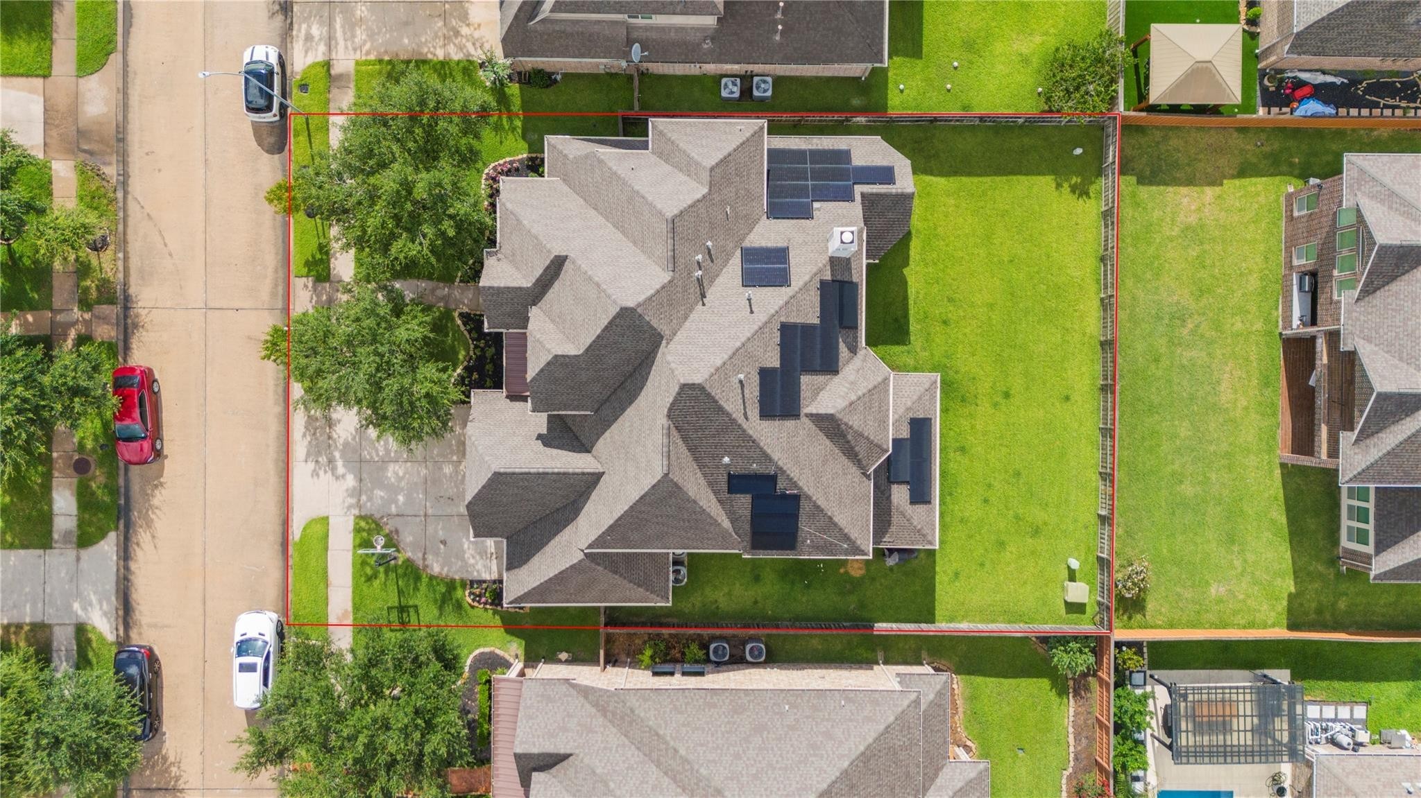 17607 Astrachan Road Richmond, TX 77407 - Photo 46 of 50 an aerial view of a house with a garden and swimming pool
