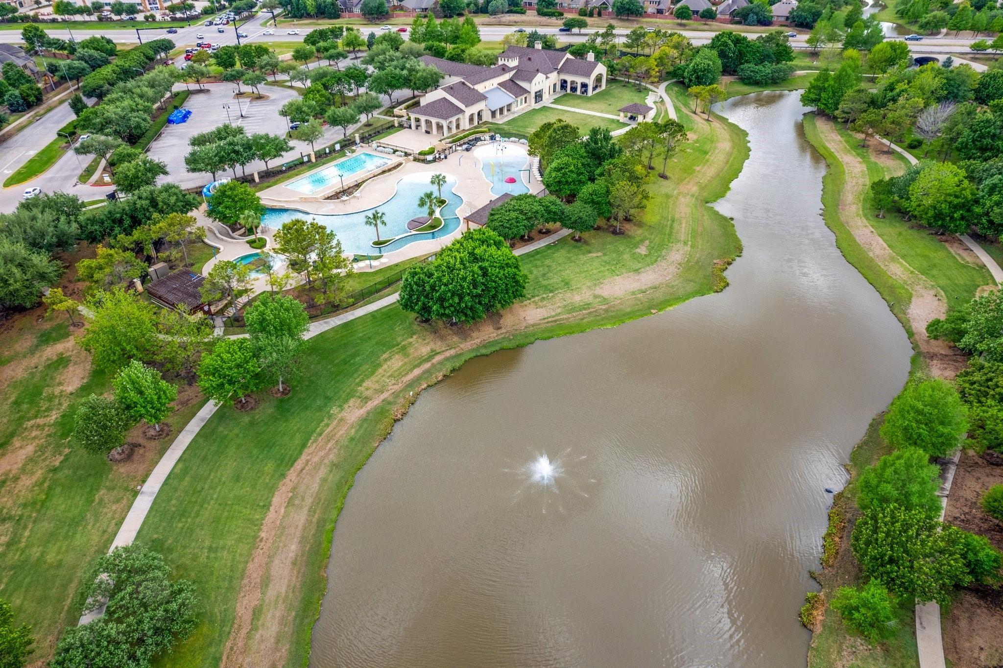 17607 Astrachan Road Richmond, TX 77407 - Photo 50 of 50 an aerial view of a house with outdoor space and lake view