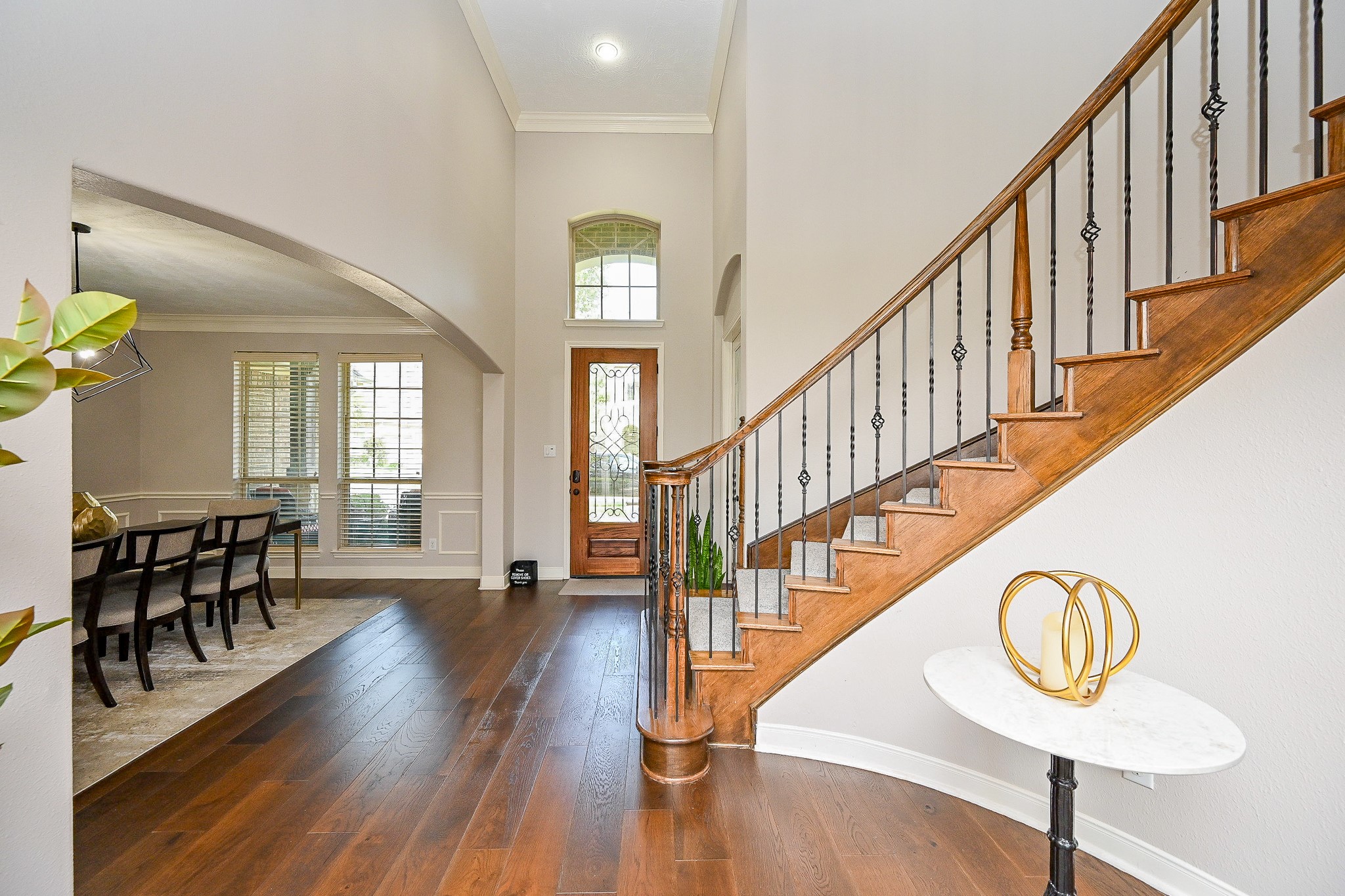 17607 Astrachan Road Richmond, TX 77407 - Photo 7 of 50 a view of entryway and hall with wooden floor