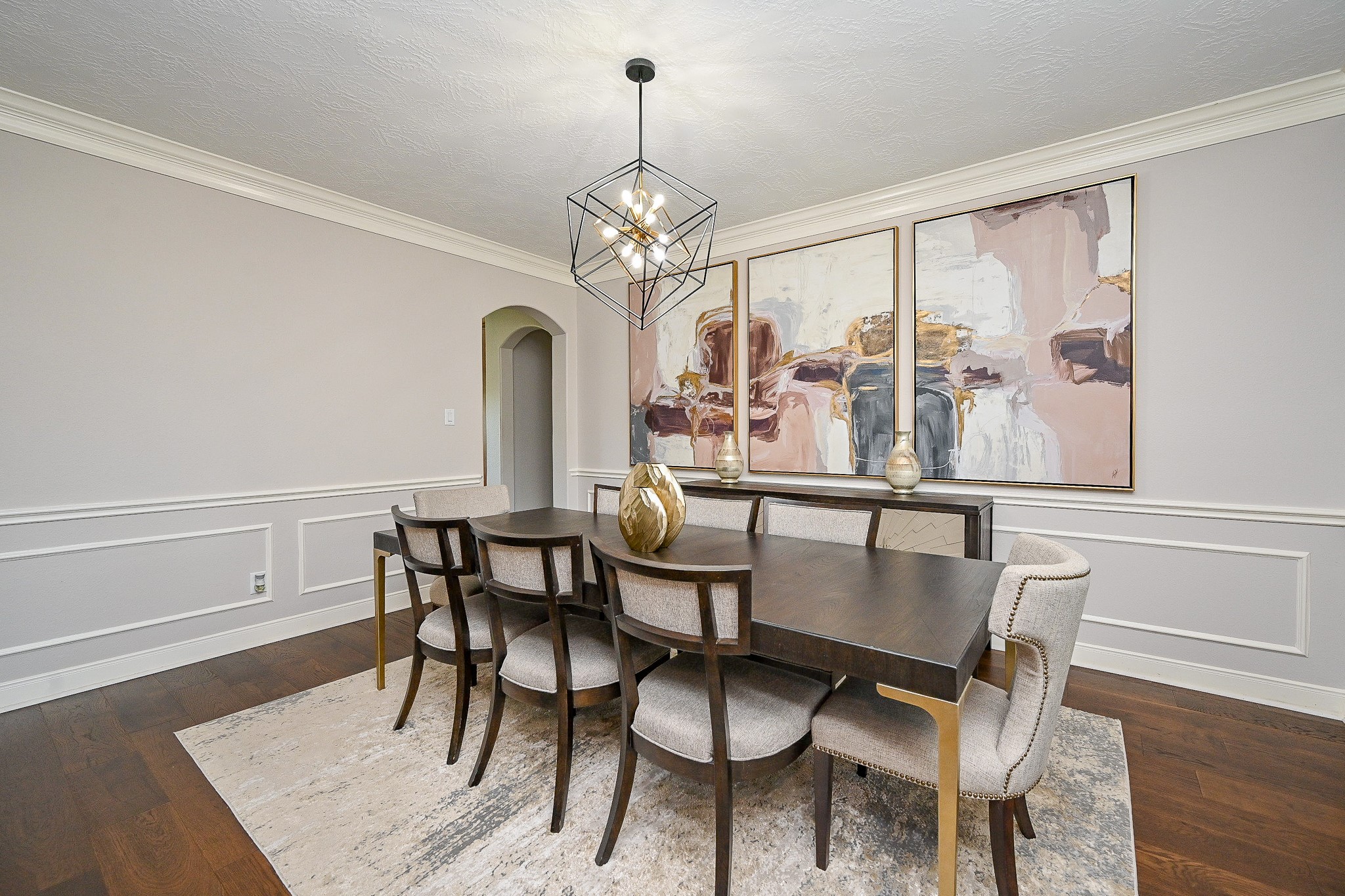 17607 Astrachan Road Richmond, TX 77407 - Photo 9 of 50 a view of a dining room with furniture a chandelier and wooden floor
