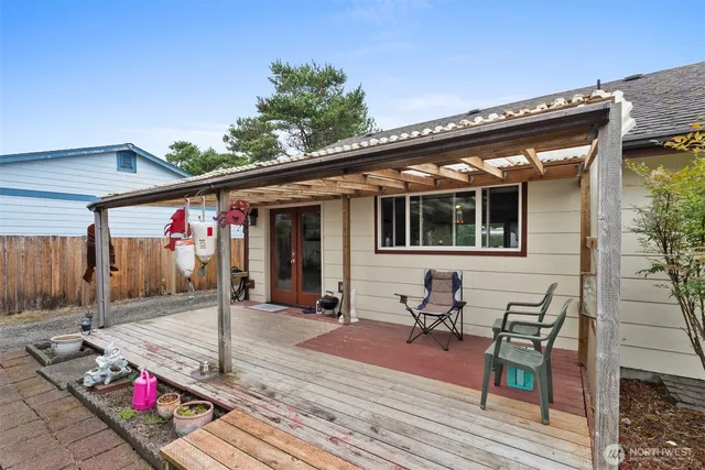 a patio with table and chairs