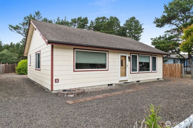 a house with trees in the background