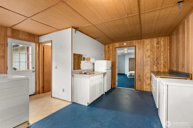 a bathroom with a sink a mirror and a shower