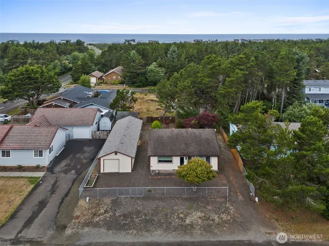 an aerial view of a house with a garden