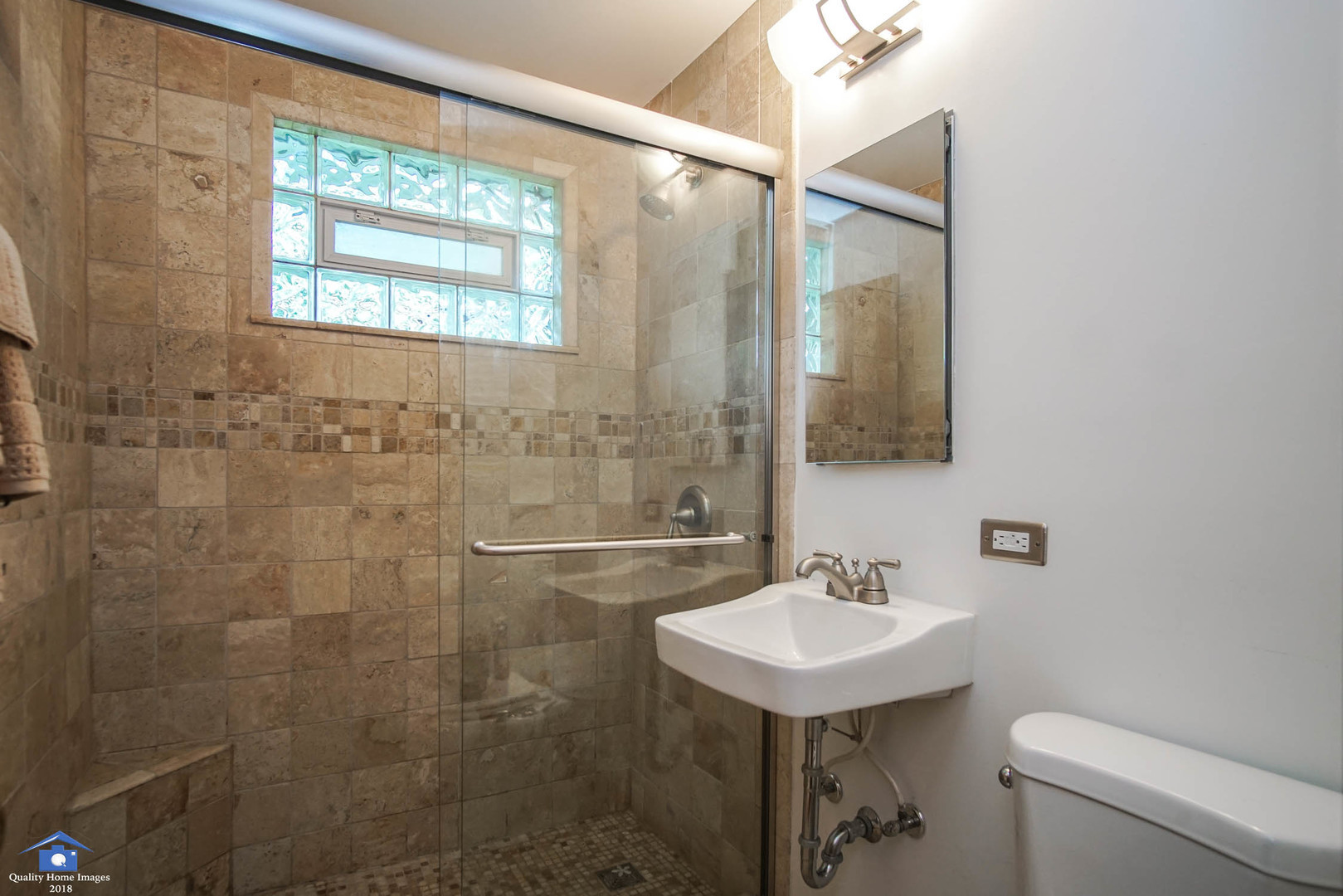 2258 Spruce Road Homewood, IL 60430 - Photo 13 of 19 a bathroom with a sink a toilet and shower
