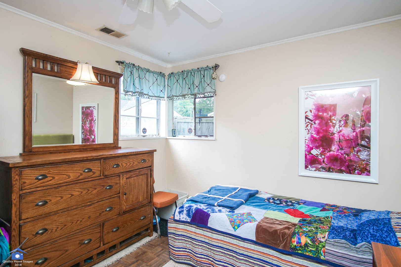 2258 Spruce Road Homewood, IL 60430 - Photo 15 of 19 a bedroom with a bed and a dresser in it