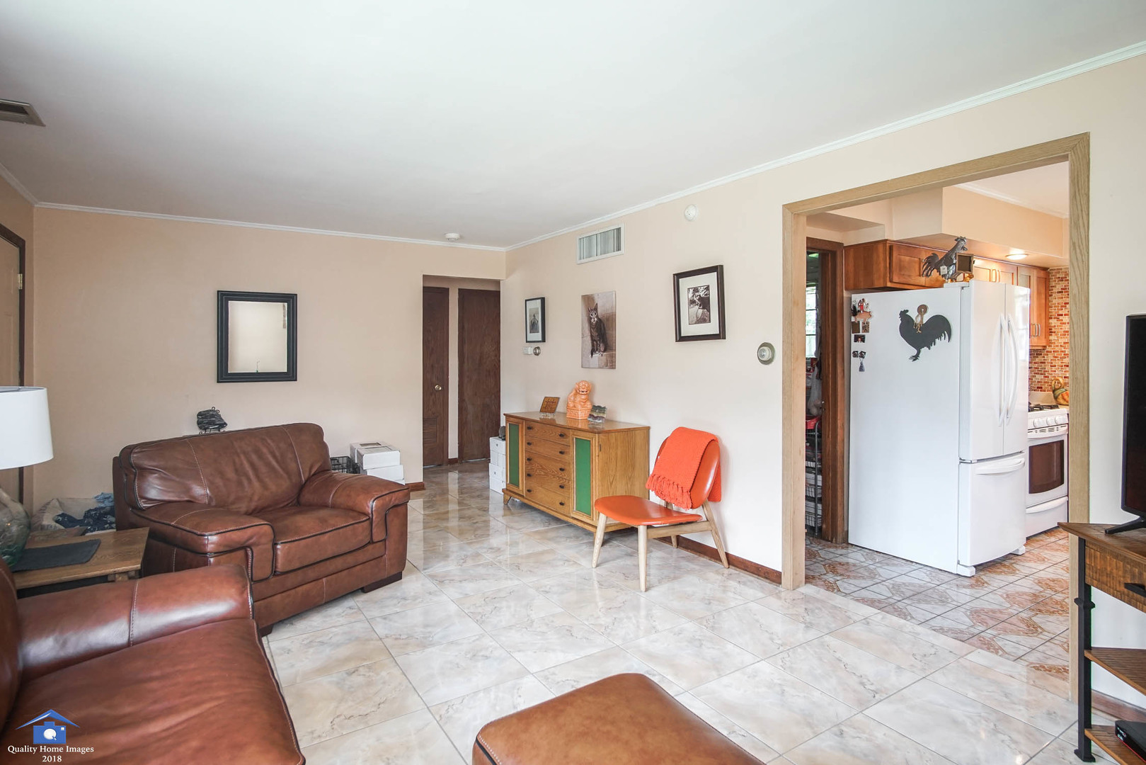2258 Spruce Road Homewood, IL 60430 - Photo 6 of 19 a living room with furniture and a chair