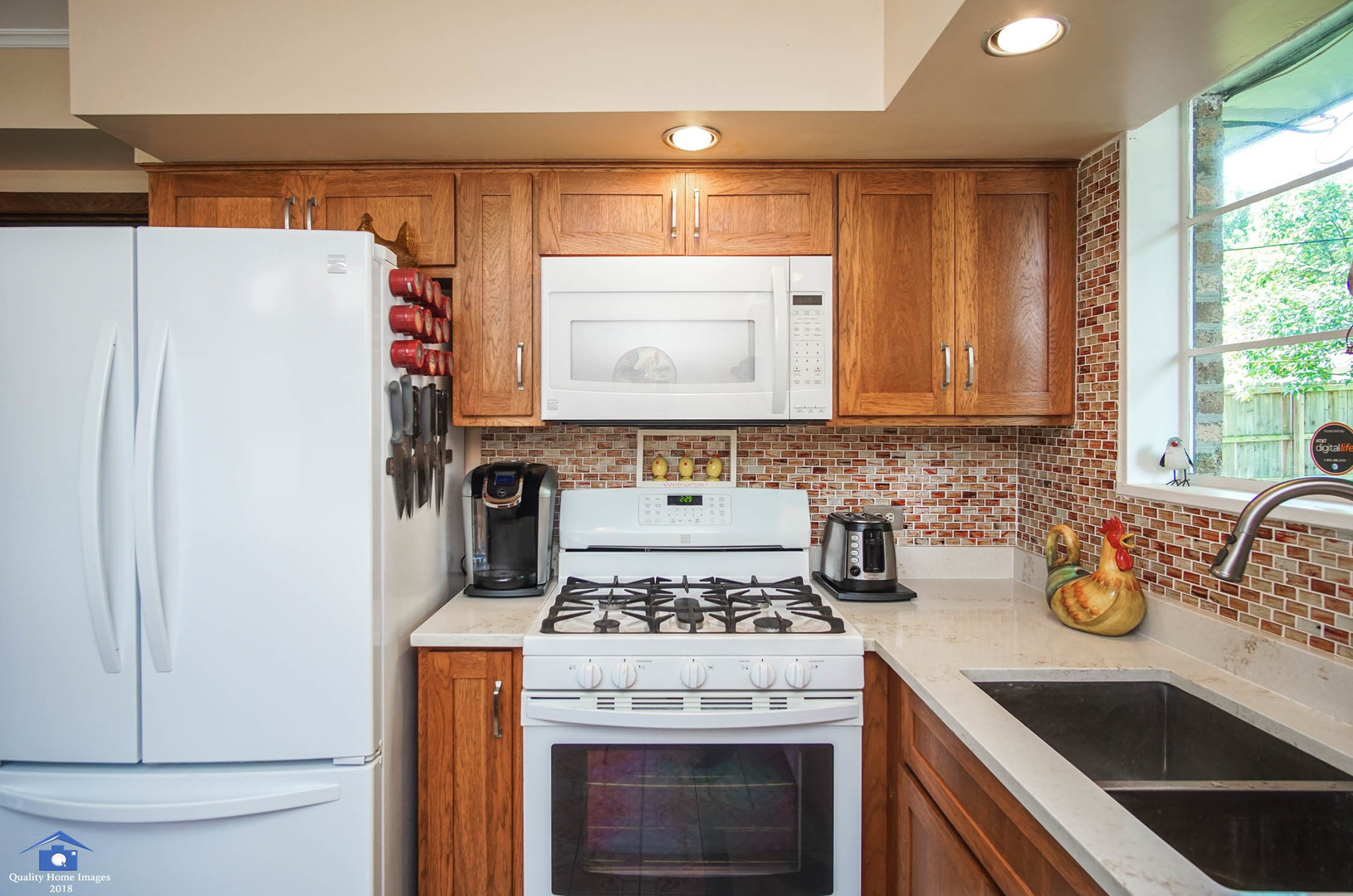 2258 Spruce Road Homewood, IL 60430 - Photo 9 of 19 a kitchen with a stove and a refrigerator