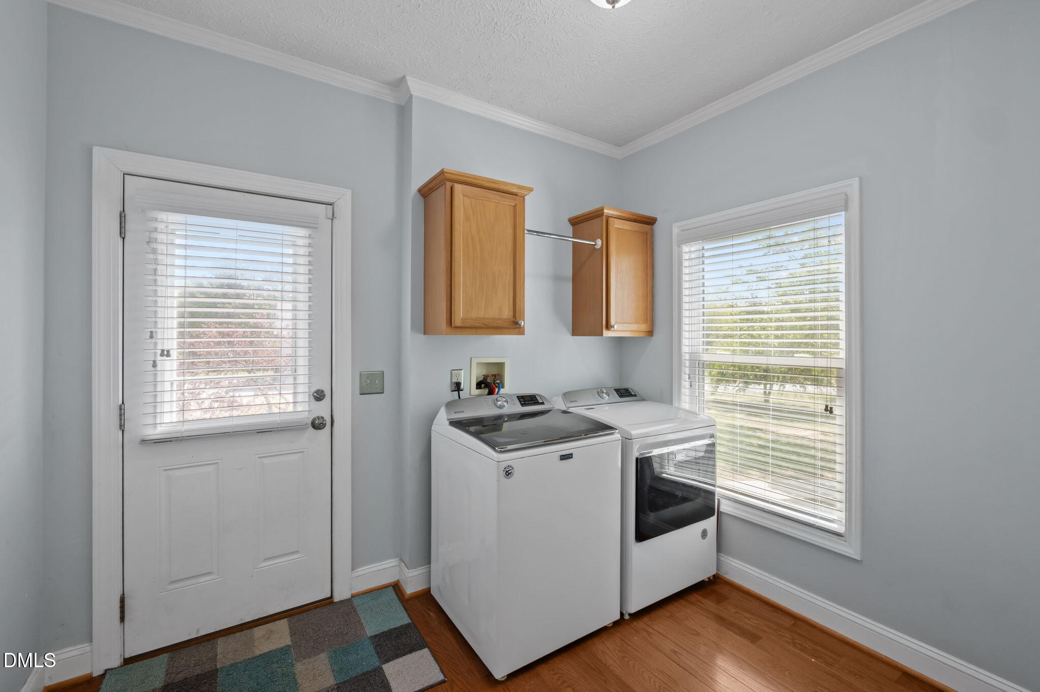 236 Dirgie Mine Road Roxboro, NC 27574 - Photo 27 of 55 a view of a kitchen with washer and dryer
