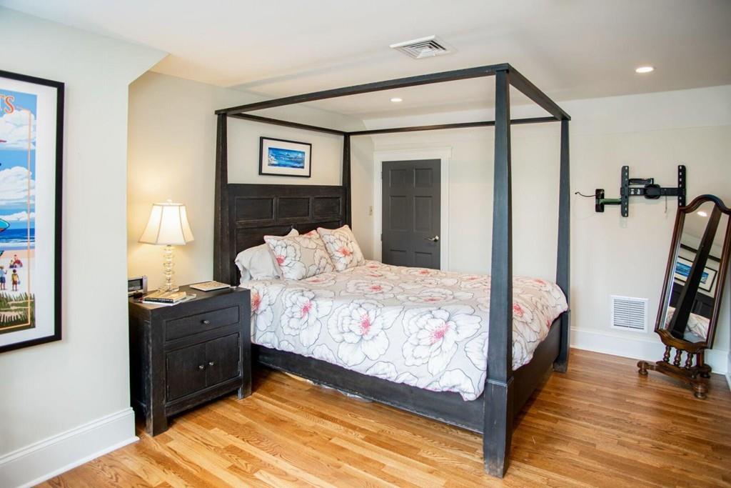 14 Hillsea Road Yarmouth, MA 02675 - Photo 32 of 42 a bedroom with a bed and a flat tv screen on the dresser