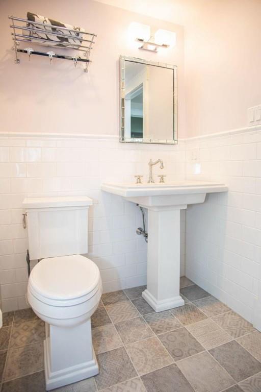 14 Hillsea Road Yarmouth, MA 02675 - Photo 33 of 42 a bathroom with a sink a toilet and mirror