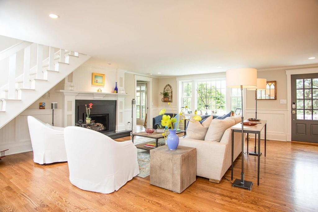 14 Hillsea Road Yarmouth, MA 02675 - Photo 6 of 42 a living room with furniture a large window and a fireplace