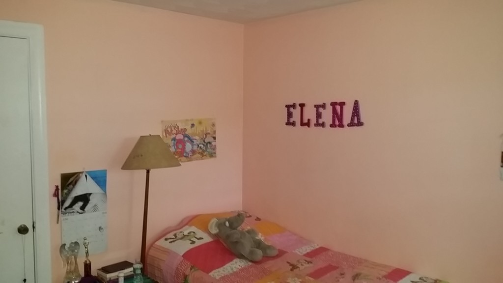 41 Audrea Road Framingham, MA 01701 - Photo 7 of 10 a bedroom with a bed and a painting on the wall