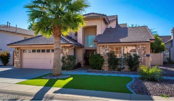 a house view with a garden space