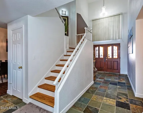 workspace with wooden floor and stairs