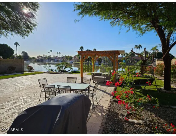 a view of a chairs and table in the patio
