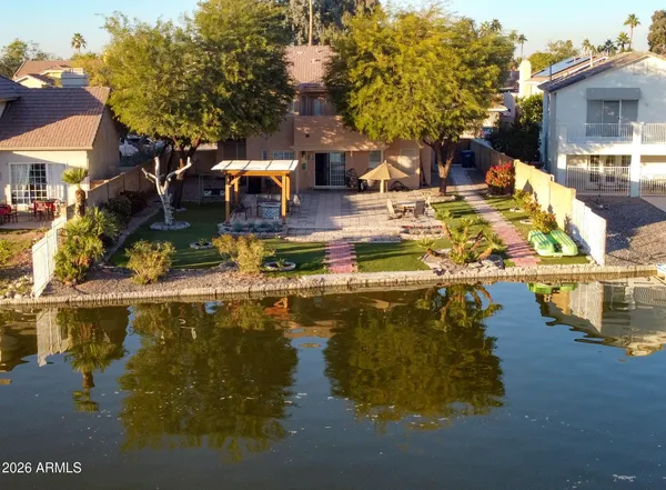 a front view of a house with swimming pool