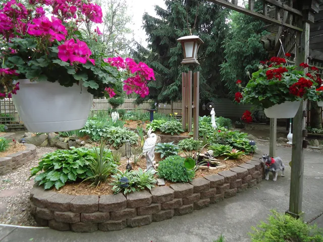 a front view of a house with a yard and fountain
