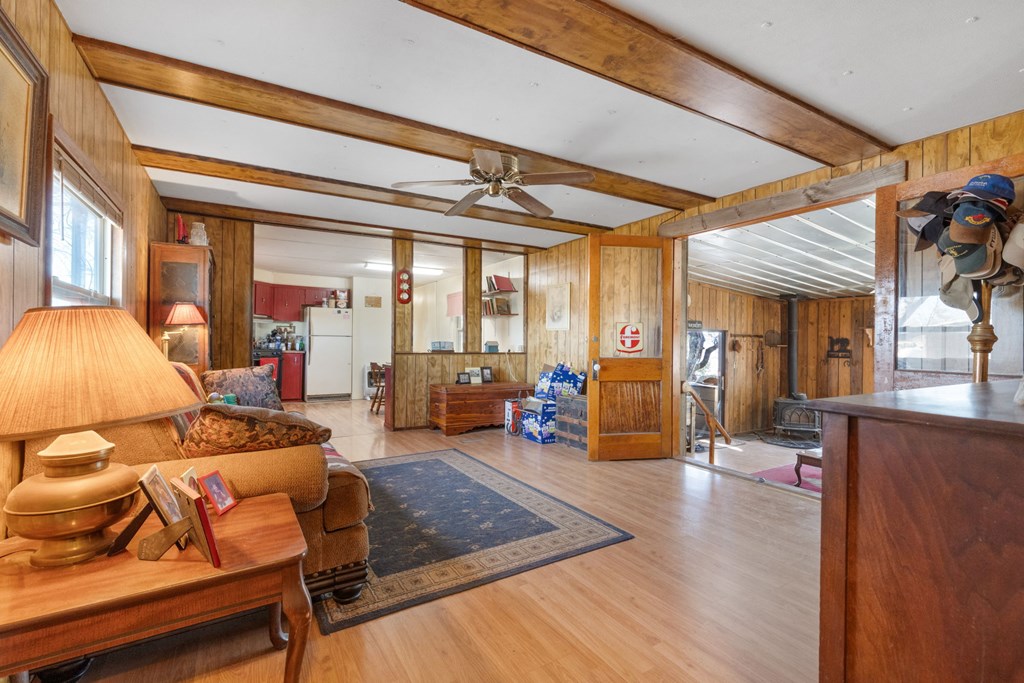 73 Fm 1221 Hext, TX 76848 - Photo 18 of 27 a living room with furniture and a chandelier