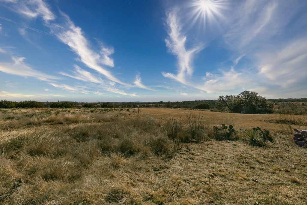 73 Fm 1221 Hext, TX 76848 - Photo 2 of 27 a view of a lake from a yard