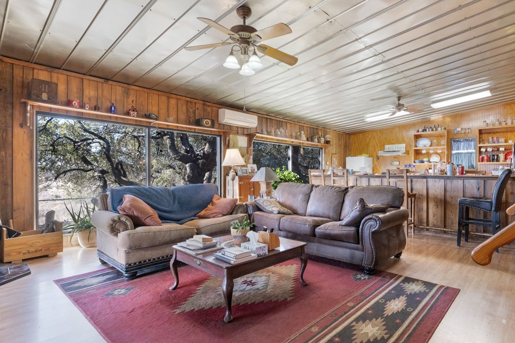 73 Fm 1221 Hext, TX 76848 - Photo 27 of 27 a living room with furniture a ceiling fan and a rug