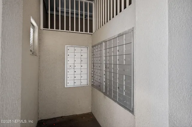 a room with gym equipment and a flat screen tv