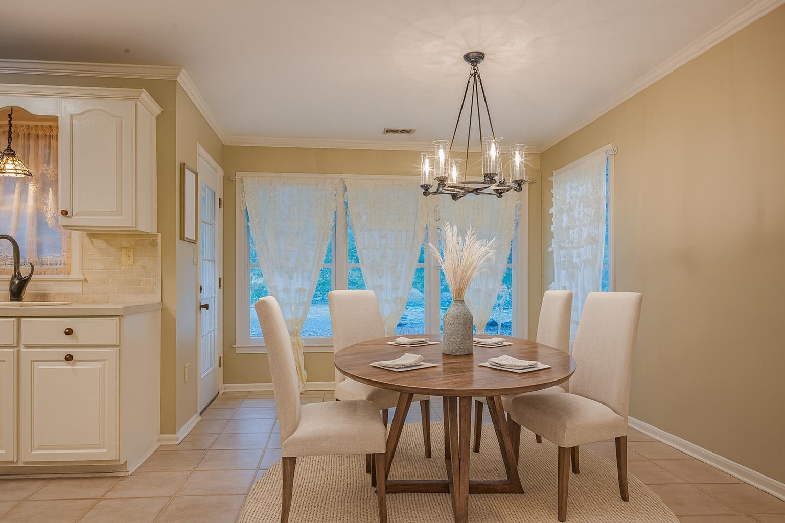 8805 River Rise Drive Memphis, TN 38016 - Photo 14 of 40 a view of a dining room with furniture and wooden floor