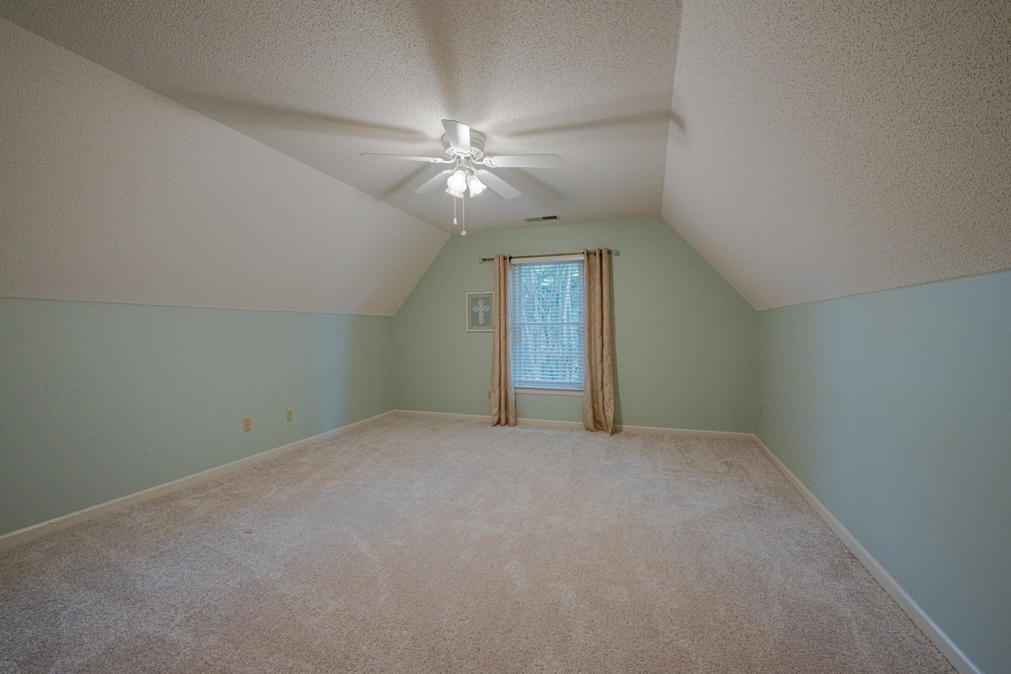 8805 River Rise Drive Memphis, TN 38016 - Photo 29 of 40 a view of an empty room with a window