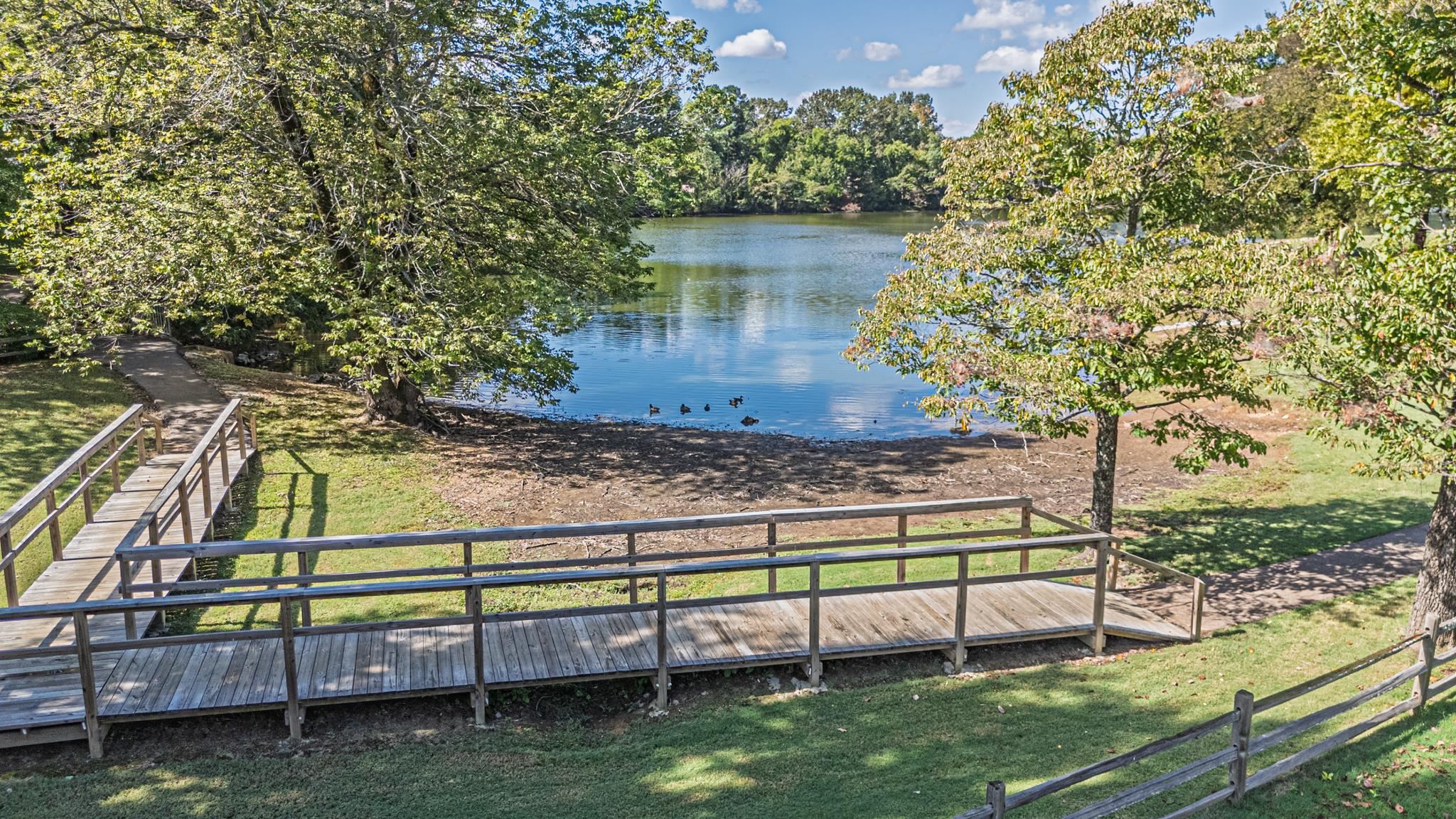 8805 River Rise Drive Memphis, TN 38016 - Photo 38 of 40 a view of a wooden deck and yard