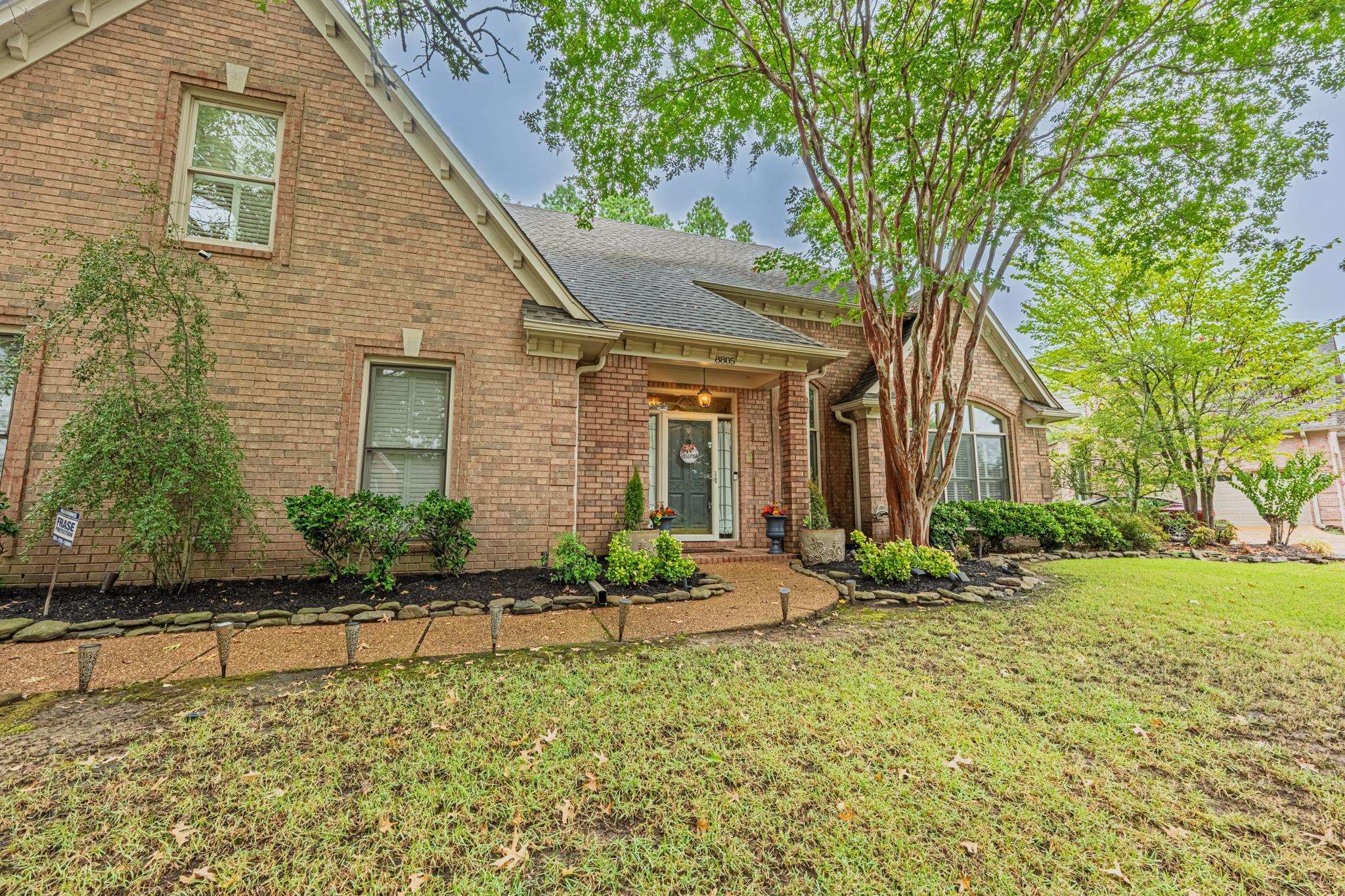 8805 River Rise Drive Memphis, TN 38016 - Photo 39 of 40 a front view of a house with a yard