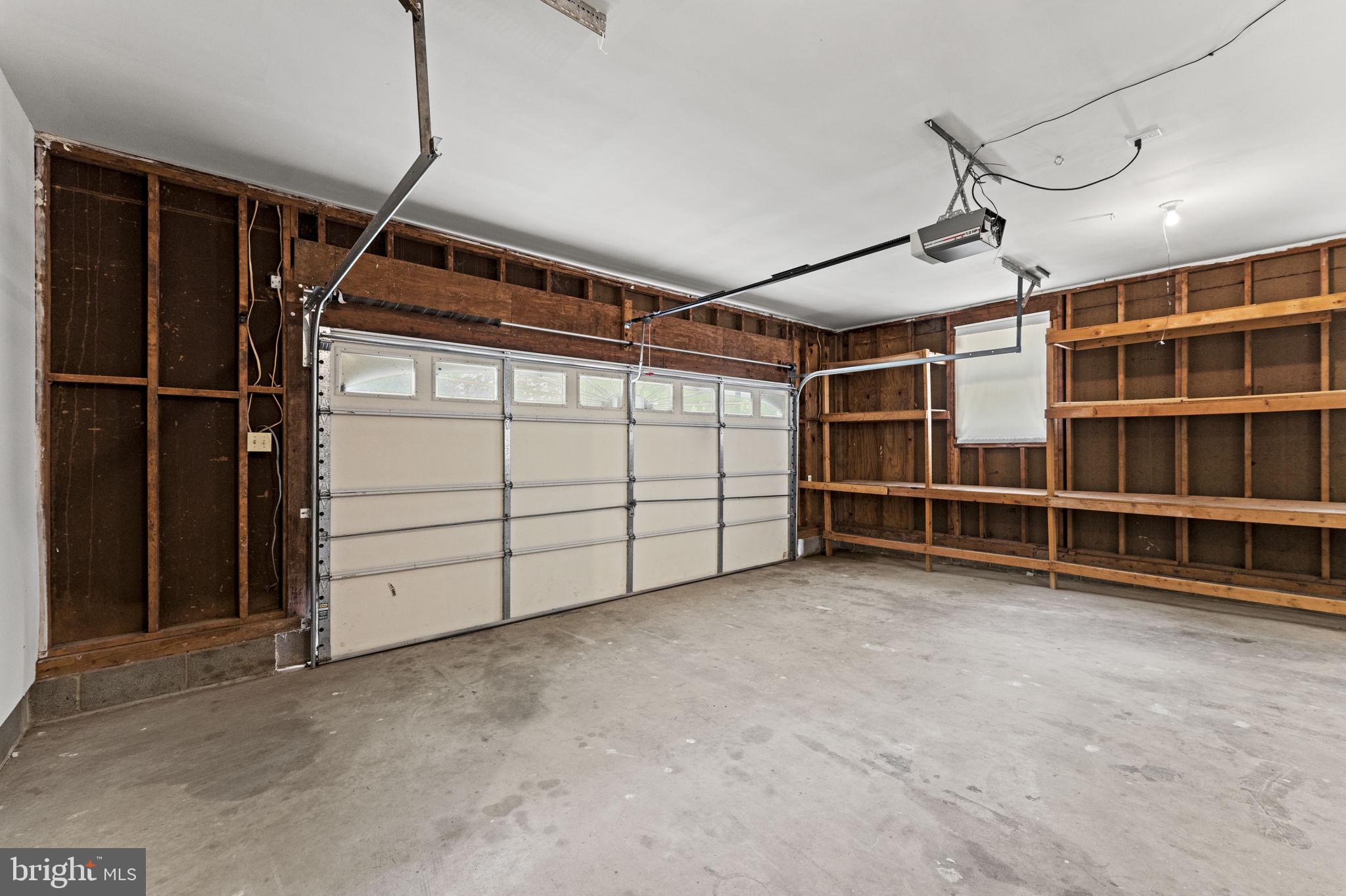 11053 Brent Town Road Catlett, VA 20119 - Photo 62 of 76 Spacious garage with insulated garage doors