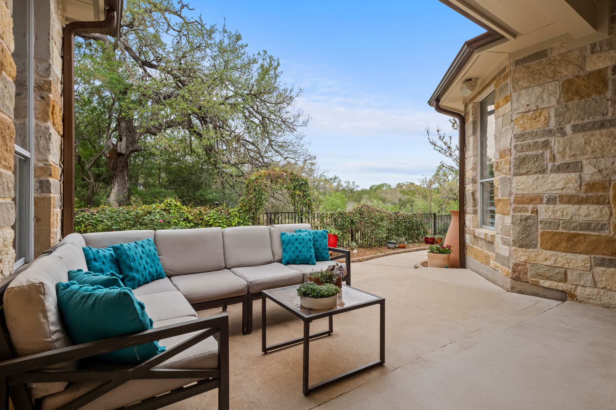 10804 Ariock Lane Austin, TX 78739 - Photo 26 of 32 a balcony with furniture and a potted plant