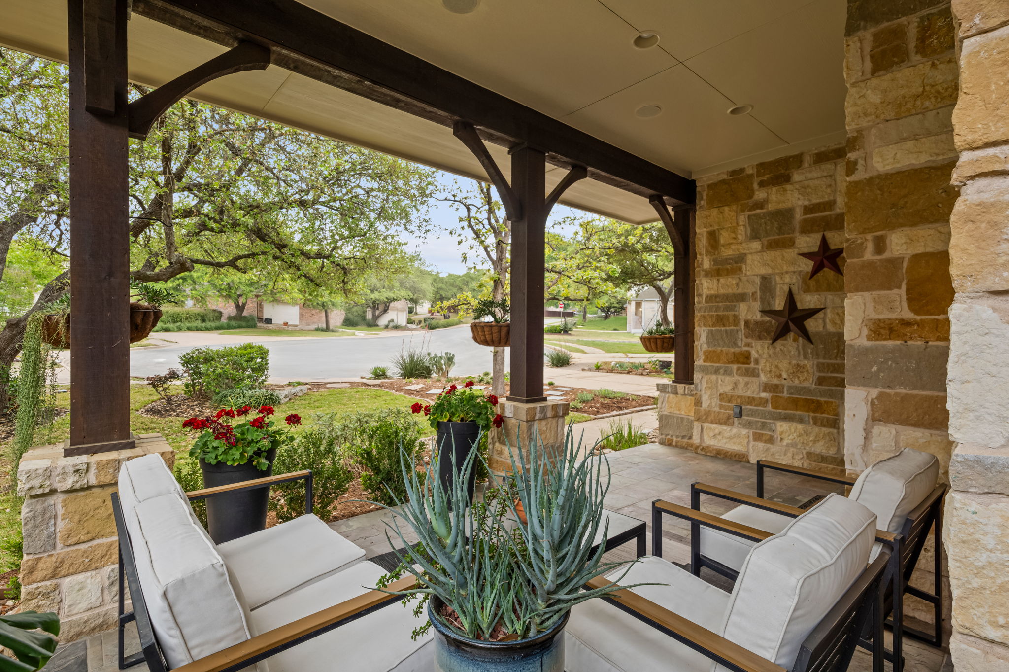 10804 Ariock Lane Austin, TX 78739 - Photo 4 of 32 a view of a porch with furniture and a potted plant