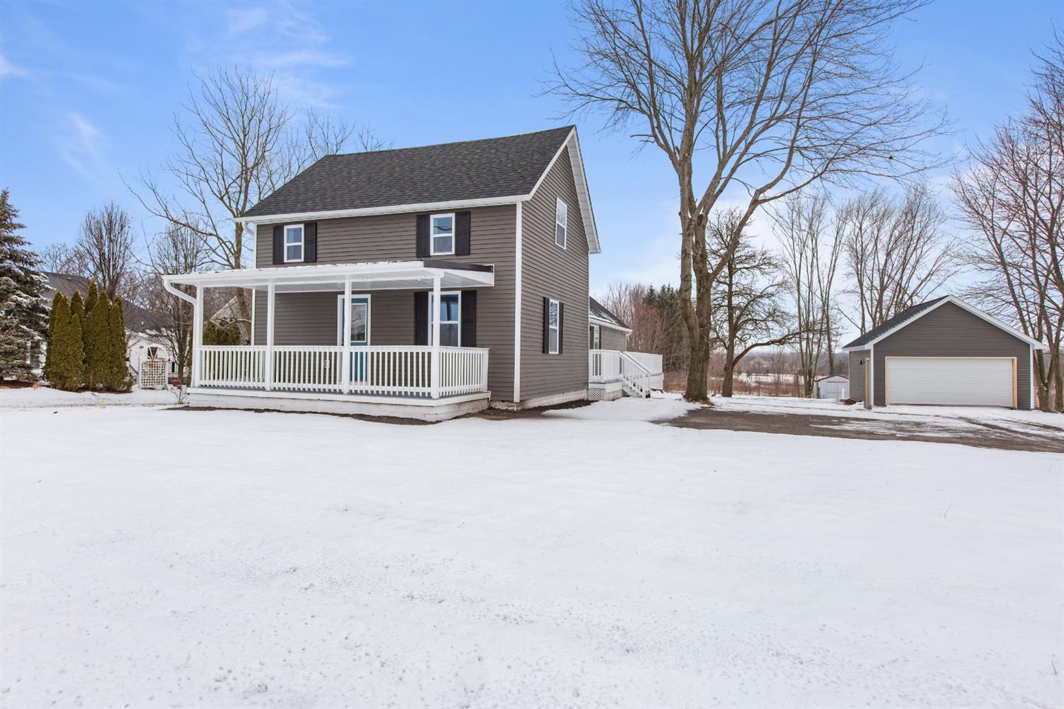 283 West Division Road Valparaiso, IN 46385 - Photo 1 of 17 front view of a house with a yard